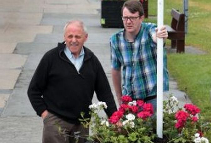 Councillor Niall McNelis and nursery owner Liam Madden inspect the last of the planters to be placed in Salthill. "I am very happy with the way the city is looking," Cllr McNelis says. Photo: Joe O'Shaughnessy.