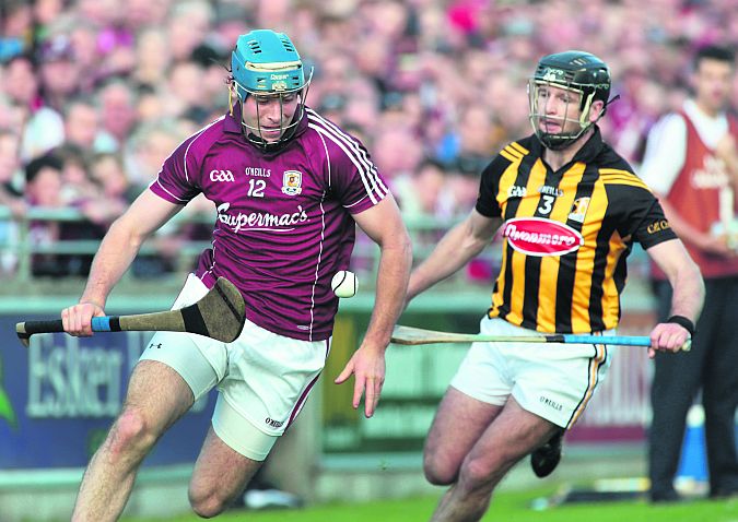 Galway's top player Conor Cooney leaves Kilkenny's JJ Delaney trailing in his wake during last Saturday evening's Leinster hurling semi-final in Tullamore. Photo: Joe O'Shaughnessy.