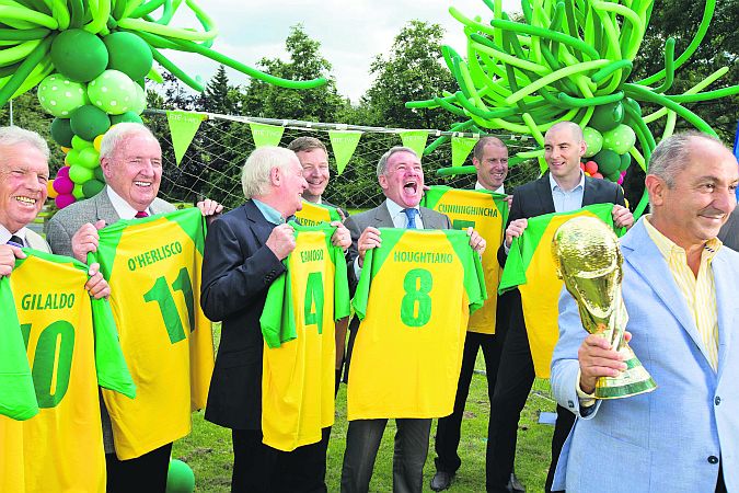 He's behind you....Kenny Cunningham at the back beside Richard Sadlier as former World Cup winner Ossie Ardiles hold the World Cup, with RTÉ's other World Cup panelists John Giles, Bill O'Herlihy, Eamon Dunphy, Darragh Maloney and Ray Houghton look on.