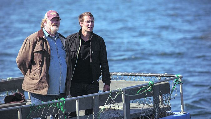 Brendan Gleeson and Taylor Kitsch in The Grand Seduction.