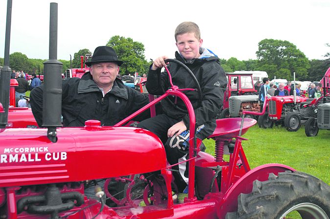 Gary and Oisín Quinn, Tuam pictured at the recent Shrule and District Vintage Show held on the grounds of Castlehackett House. Photo: Johnny Ryan.
