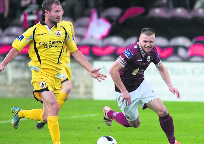 Galway FC's Stephen Walsh and Longford Town's Pat Sullivan in action during last Friday night's First Division tie at Eamonn Deacy Park. Photo: Joe O'Shaughnessy.