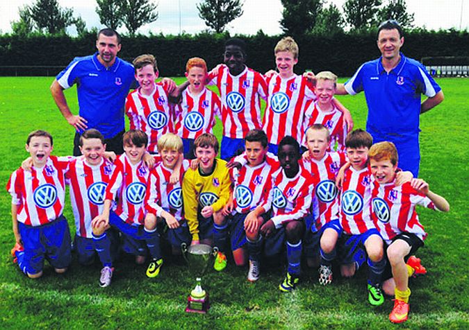 The Knocknacarra FC U-13 squad who won the Volkswagen Junior Masters tournament in Dublin at the weekend. Back row, from left: Martin Zatonski (assistant coach), Rory O'Brian, Rian Kelly, Di Angelo Massah, Stephen Iredale, Harry Comer and Darren Roach (coach). Front: Daniel Joyce, Conor Dixon, Leo Byrne, Ethan Fiorentini, Ethan Nolan, Kasper Zatonski, Edric Epuko, Conor Egan, Matthew Thompson and Gavin Dempsey.