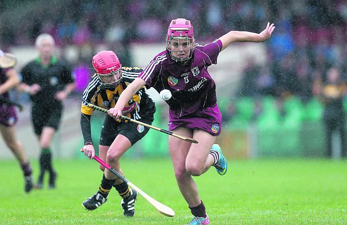Galway attacker Orlaith McGrath has first run on Kilkenny's Jacqui Frisby during Sunday's All-Ireland senior camogie semi-final at the Gaelic Grounds. Photo: Ryan Byrne/Inpho.