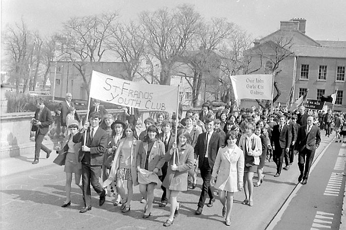 Participants in the Galway Youth Council's first-ever Youth Day in 1969 crossing the Salmon Weir Bridge. As part of the day's activities, the city's eight youth clubs, colleges and other youth organisations took part in the parade to Galway Cathedral, where a special Youth Mass was attended by about 2,000 young people.