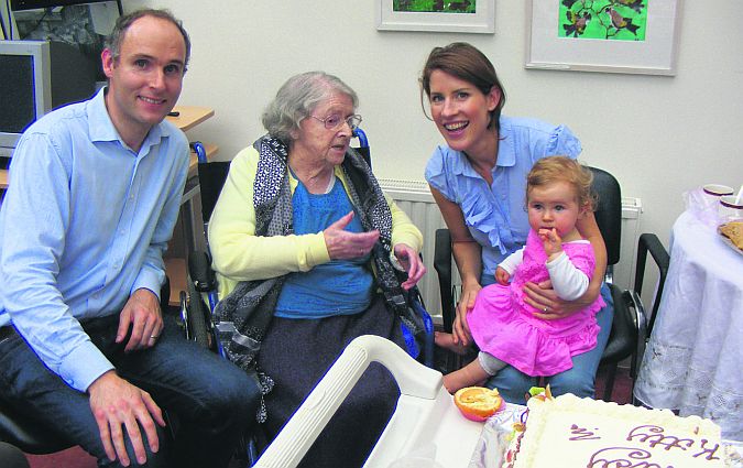 The youngest Bowling Green resident, Anna Grant (11 months) with her parents Kevin and Eimer at the celebration of Kitty Kelly's 101st birthday.