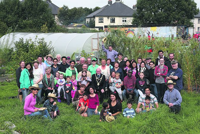 The Mayor of Galway City, Cllr Donal Lyons, with volunteers and local people in the Ballinfoile Mor Community Garden. Photo: Joe O'Shaughnessy.