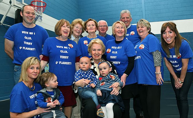 Terry 'Poll Topper' O'Flaherty pictured with some of her supporters decked out in her campaign t-shirts at the election count back in May.