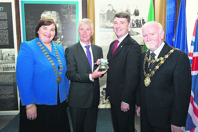 Galway County Council cathaoirleach Cllr. Mary Hoade, Paul Molumby Central Bank Director of Currencies, Peter Heffernan CEO Marine Institute and Mayor of Galway City Donal Lyons at the Central Bank's launch in the Marine Institute in Oranmore of a €15 limited edition Silver Proof collector coin to commemorate John Philip Holland [1841 - 1914], the Irish born inventor of the modern submarine.