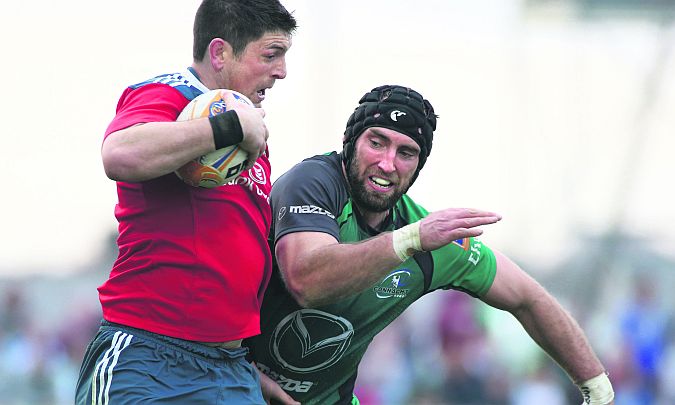 Connacht captain John Muldoon, in action against Munster's James Downey, is positive about the squad's propects of being consistently competitive this season.