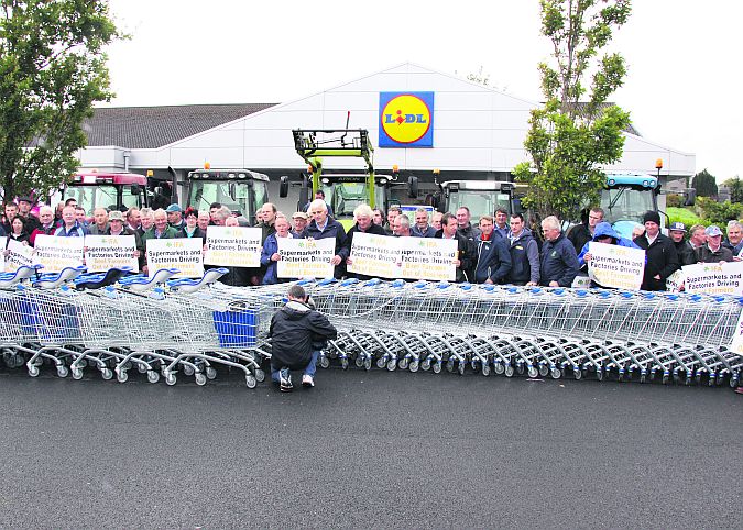 Farmers protesting outside in the carpark of Lidl Ballinasloe. At least 100 farmers and 20 tractors turned up at the protest where all the trollies were chained up during the protest.