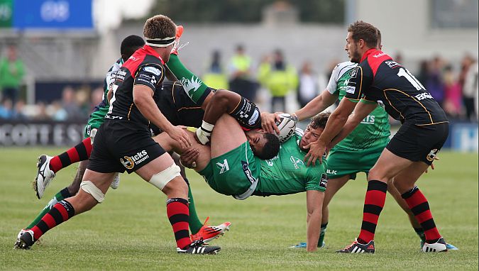 Connacht's Danie Poolman is tackled by Aled Brew and Jason Tovey (right) of Newport Gwent Dragons during Saturday's Guinness Pro12 encounter at the Sportsground. Photo: Joe O'Shaughnessy.