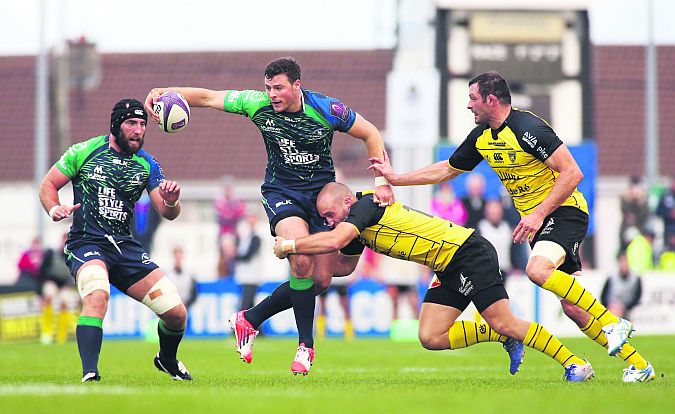 Connacht's Robbie Henshaw is tackled by Arthur Cestaro of La Rochelle in the Sportsground on Saturday. Photo: Joe O'Shaughnessy.