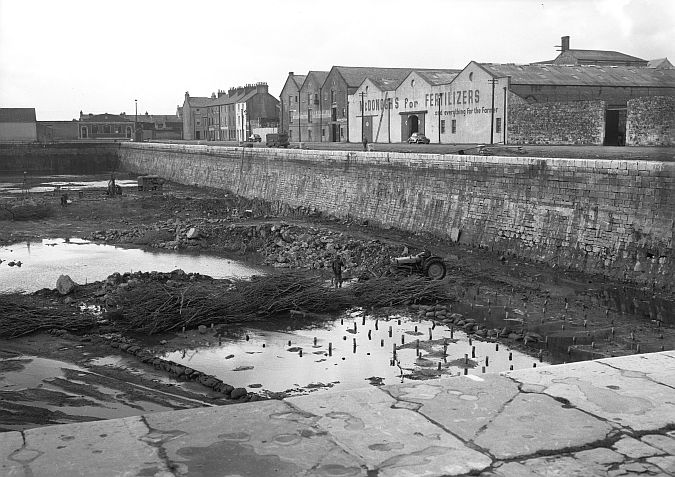 Galway Docks in October 1964 at the time of a £340,000 Harbour Development Scheme, involving the deepening of the Commercial Dock and joining it with Dun Aengus dock.
