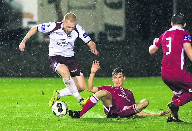 Ryan Connolly, who scored Galway FC's first goal and set up the second, tries to evade the challenge of Shelbourne's Adam O'Connor in Eamonn Deacy Park on Friday night. Photo: Joe O'Shaughnessy