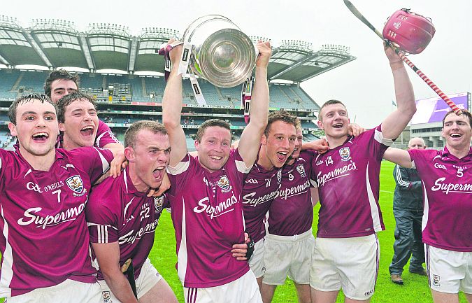 Galway players celebrate after winning the Bob O'Keeffe Cup in 2012, three years after entering the Leinster Championship.