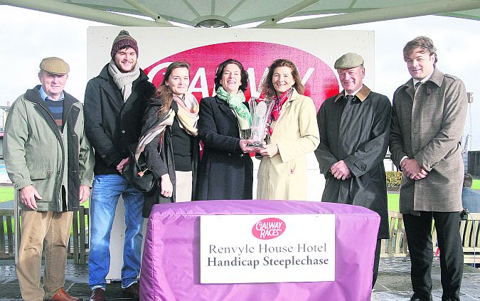 Zoe Fitzgerald presents the winning trophy to Ronagh O'Brien after Valours Minion won the Renvyle House Hotel Handicap Steeplechase at the October meeting at the Galway Races. Also in photo are, Val O'Brien, trainer, Gary O'Brien, Barbara O'Brien, Seán O'Brien and Niall O'Brien.