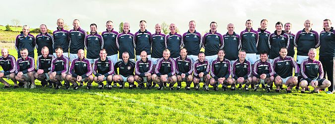 The Galway Masters squad which will face Mayo in the All-Ireland final in Clonberne on Saturday. Back row: Stephen Joyce (Joint Manager, Clonbur), John Wilson (Killererin), Dónal Ó Flatharta (Spiddal), Colin McCaul (Salthill/Knocknacarra), Brian Walsh (Cortoon Shamrocks), Connie Guidera (Carraroe), Paul Bradley (Cortoon Shamrocks), Tom Corbett (Headford), Kevin Brennan (Kilkerrin/Clonberne), Timmy Ó Flatharta (Spiddal), Conor McGauran (Salthill/Knocknacarra), Colin Daly (Kilkerrin/Clonberne), David Glynn (Caherlistrane), Kieran Kelly (Cortoon Shamrocks), Sean Ó Neachtain (Carraroe), David Cronin (Dunmore McHales), Finbar Thomas (Killannin), Seamus Ó Ráinne (Leitir Mór), Matt Duggan (Joint Manager, Annaghdown). Front row: Kevin Lee (Headford), John Slattery (Dunmore McHales), Sean Flatharta (Salthill/Knocknacarra), Denis Fallon (Dunmore McHales), Ger Lee (Headford), Pat Cullinane (Sarsfields), Declan Beirne (Vice Capt, Athenry), Seamus Silke (Williamstown), John Davin (Tuam Stars), Richard Donovan (Captain, Claregalway), Mairtín Ó Chonaghaile (Carraroe), Eamon Ó Shea (Salthill/Knocknacarra), Padraic Reilly (Caherlistrane), John O'Reilly (Salthill/Knocknacarra), Brian Silke (Corofin), Francie Browne (Caherlistrane). Missing from photo: Ollie Hynes (selector, Tuam Stars), Marion Reynolds (physio, Mountbellew/Moylough), Trevor Burke (Corofin), Tom Walsh (Kilkerrin/Clonberne), Danny Kelly (Athenry), Noel Dempsey (Mountbellew/Moylough), Muiris Quinn (Barna), Eoin Mc Ginn (Salthill/Knocknacarra), Leo Hynes (Cortoon Shamrocks), Alan Feerick (Milltown), Brian Forde (Milltown), Carl Donlon (Salthill/Knocknacarra), Eoin Godwin (Milltown), Mark Kelly (St. James’), Proinnsias Glynn (Milltown), Tom Greaney (Corofin).