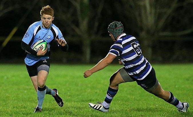 Galwegians Jerome Harrimate tries to avoid the challenge of Corinthians Pat O'Toole during Friday night's AIL Division 1b tie at Cloonacauneen. Photo: Joe O'Shaughnessy.