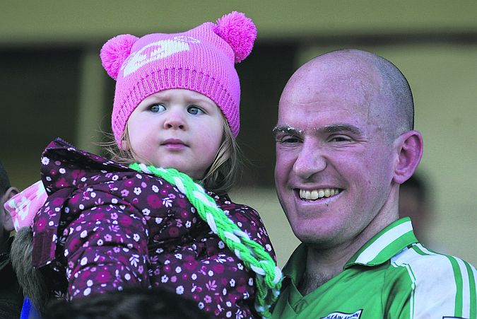 Oileáin Árainn's Eoghan Poill with his daughter Keely after their Connacht Junior Club Football Championship Final triumph at Tuam Stadium last Sunday. Photo: Enda Noone.