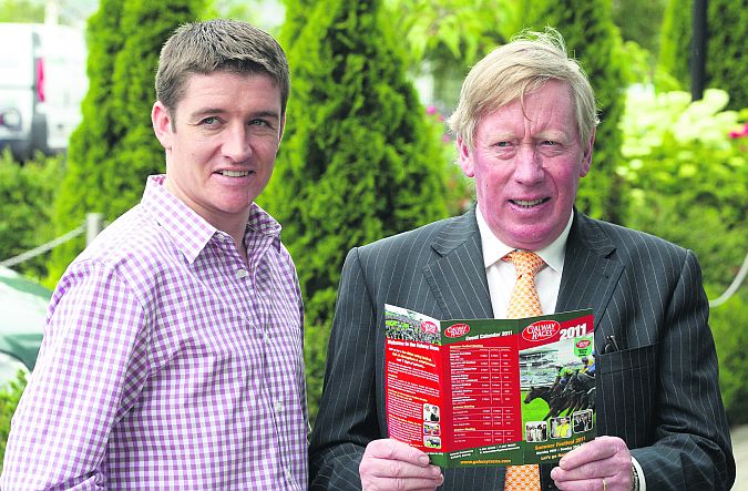 John Moloney, Manager of Galway Racecourse, who is stepping down from his post after next year's Summer Festival, pictured with top jockey Barry Geraghty.