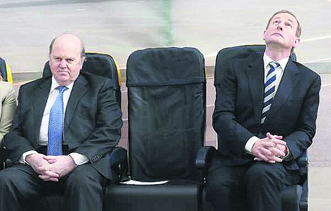 Is that a safe seat?....Finance Minister Michael Noonan and Taoiseach Enda Kenny were on the attack.