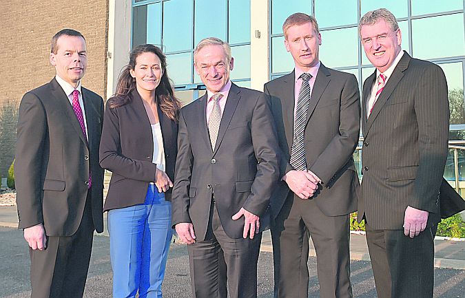 Minister for Jobs, Enterprise and Innovation Richard Bruton on his recent visit to Thermo King where he was joined by (from left) Brendan McDonagh and Catherina Blewitt of IDA Ireland, Mike Stratford, Head of Finance TK Galway, and Kevin Sherry of Enterprise Ireland.