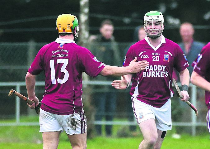 Clarinbridge substitute Micheal Forde (20) celebrates with Liam Donoghue after scoring a goal during their County Junior B hurling final victory over Kinvara in Ballinderreen last Saturday. Photos: Joe O'Shaughnessy.