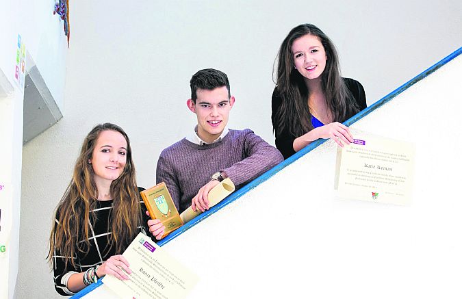Past pupils of Gort Community School who were recognised by their Universities for their outstanding results in last year's Leaving Certificate exams (from left) Ronja Pfeiffer from Kilcolgan, who was awarded a €1,500 Excellence Scholarship from NUI Galway for her achievement of 615 points; Sean Walsh from Beagh, was awarded and Entrance Scholar Award by UCD for his achievement of 605 points, and Katie Keenan from Beagh, who was awarded a €1,500 Excellence Scholarship from NUI Galway.