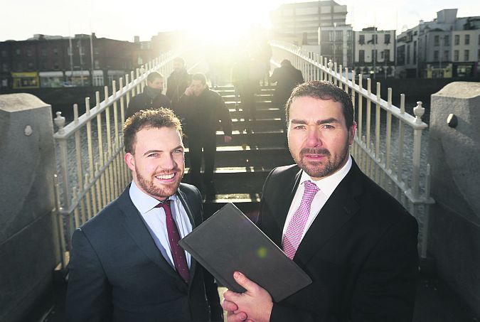Mark Kellett, CEO of Magnet, (Right) and Patrick Kennedy of Amarach Research discussing the Magnet Regional Business Barometer, a study of 600 SMEs which showed that small firms in the Mid West and Dublin are most confident for the year ahead. Picture: Finbarr O'Rourke