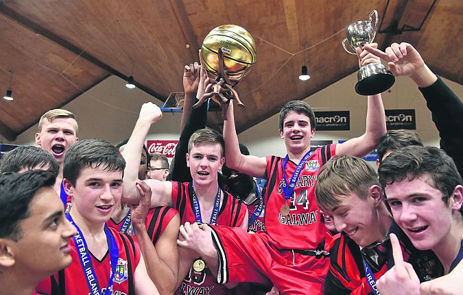 St Mary's College, Galway captain Sean Kelly celebrates with his team-mates after defeating St. Vincent's, Glasnevin in the All-Ireland Schools Cup U19 B Boys Basketball Final in the National Basketball Arena, Tallaght on Tuesday. Photo: David Maher/Sportsfile.