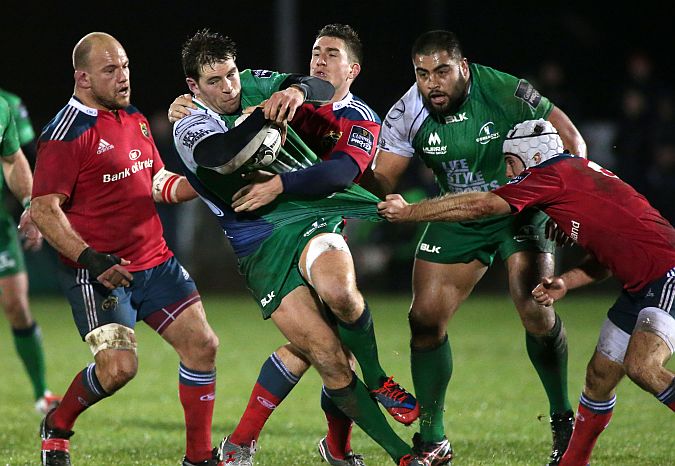 Connacht's Danie Poolman, who has Rodney Ah You in support, is tackled by Munster's Duncan Williams, JJ Hanrahan and BJ Botha at the Sportsground last Thursday. Photo: Joe O'Shaughnessy.