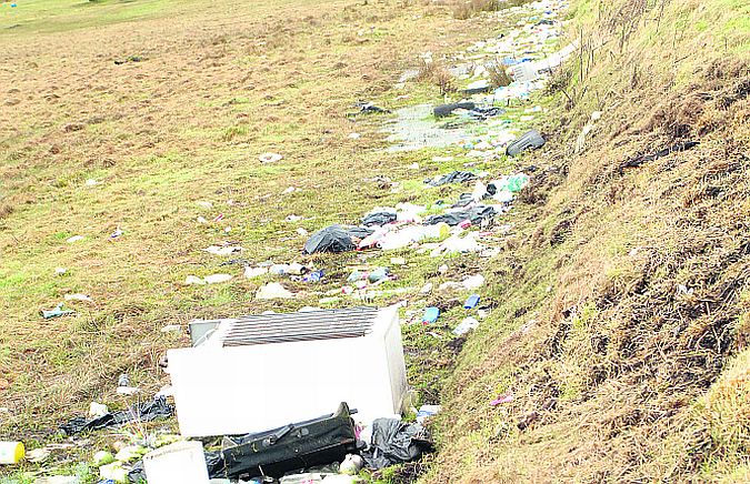 DISGRACE . . . Some of the illegal dumping that has taken place in the Cloonthue area of Tuam. Photo: Johnny Ryan Photography.