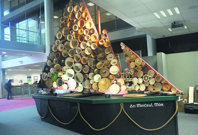 The half-scale Claddagh Hooker, with its sails covered in bowls and platters, created by the Galway Chapter of the Irish Woodturning Guild.