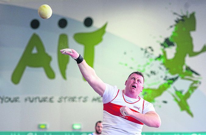 Sean Breathnach, Galway City Harriers AC, on his way to winning the Shot Putt event during Day 2 of the GloHealth Senior Indoor Championships in the Athlone International Arena. Photo: Sportsfile.