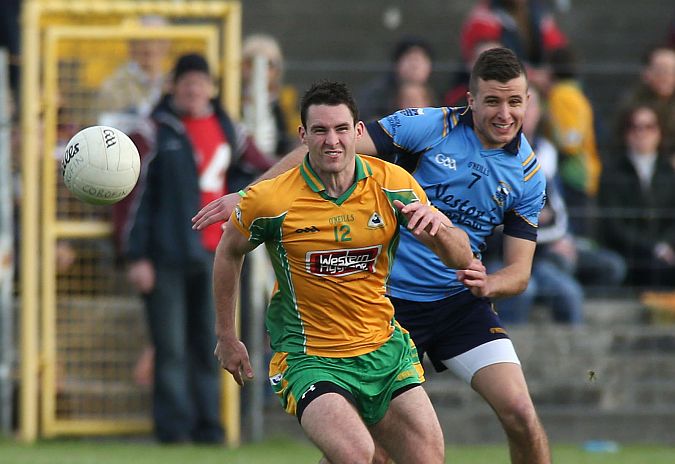 Corofin's Mike Farragher and Salthill Knocknacarra's Sean Gavin in action during the 2013 Galway football final. The clubs have been drawn to meet each other in the first round of this year's championship.