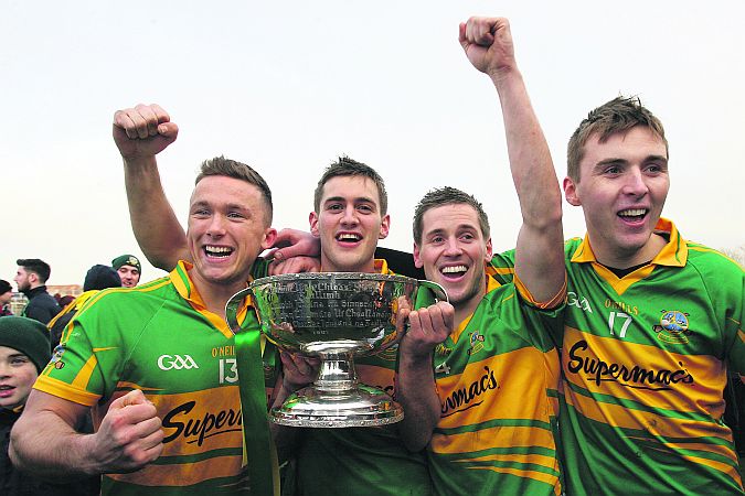 Gort players Gerard O'Donoghue, Richard Cummins, Michael Cummins and Conor Helebert with the Tom Callanan Cup after last year’s county final triumph.