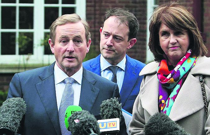 Moment of truth...Taoiseach Enda Kenny and Tanaiste Joan Burton, with Sean Sherlock Minister of State at Department of Foreign Affairs in the background.