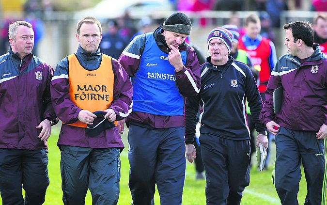 TROUBLED TIMES: Galway football selectors Sean Conlon and Brian Silke, team manager Kevin Walsh, trainer Greg Muller, and stats man, Denis Carr, in pensive mood after their defeat to Laois at Tuam Stadium last Sunday.