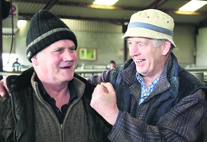 Gerry Finneran and John Higgins, from Ballygar, enjoy a bit of 'tomfoolery' at the Mountbellew Mart Show and Sale last week. Picture: Hany Marzouk