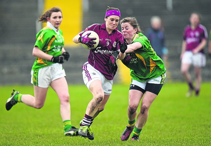 Galway's Geraldine Conneally breaking past the challenge of Kerry's Maria Quirke during Sunday's National League tie at Tuam Stadium. Photos: Pat Murphy/Sportsfile.