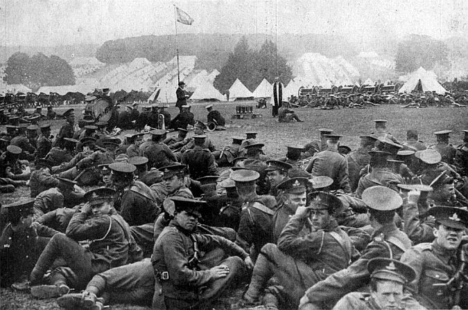 Last prayers: Members of the 10th Irish Division at camp in Basingstoke, England, attending a prayer service – and throwing an eye at the camera too – as they prepared to depart for the front line in 1915, many of them never to return.