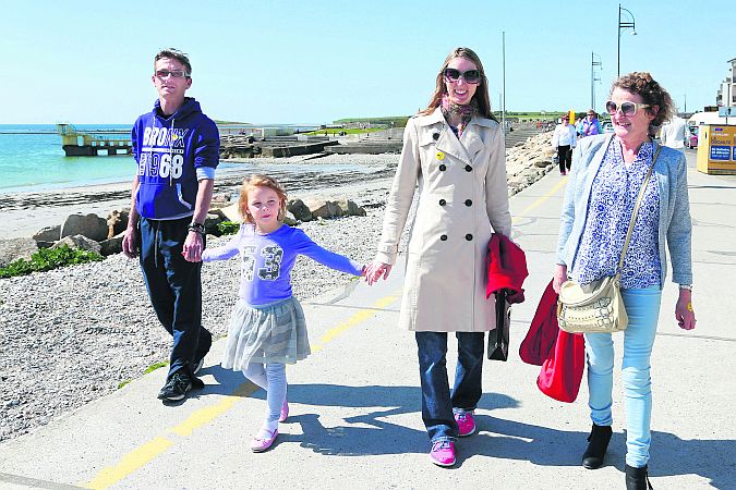 Maoiliosa Atkinson from Loughrea and now living near Sydney in Australia, with her daughter Kate, her brother Oliver Hynes, Loughrea and their cousin Mary Lou Hynes from Castlegar (right) while taking a stroll on the Salthill promenade during the sunshine.