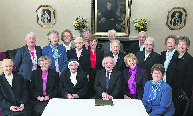 President Michael D Higgins and his wife Sabina visited the Presentation Order to mark the 200th anniversary of the orders arrival in Galway city. They are pictured with some of the sisters at the Presentation Convent. Front row: Sisters Angela Murphy, Gertrude Shortall, Columbiere Scully, President Michael D Higgins and his wife Sabina, and Sr. Helen Hyland. Back Row: Sisters Esther Halvey, Bernadette Breathnach, Regina Walsh, Brid Leonard, Kathleen McDonagh, Imelda Walsh, Pauline Morris, Clare Hogan, Anne Fox, Maire McNiallias, Kathleen Fahy and Margarita Ryan. Photos: Joe O'Shaughnessy.