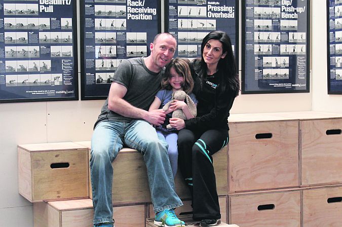 Tom and Claudia French with their daughter Simona at the family run business, French Vanoli School of Fitness.