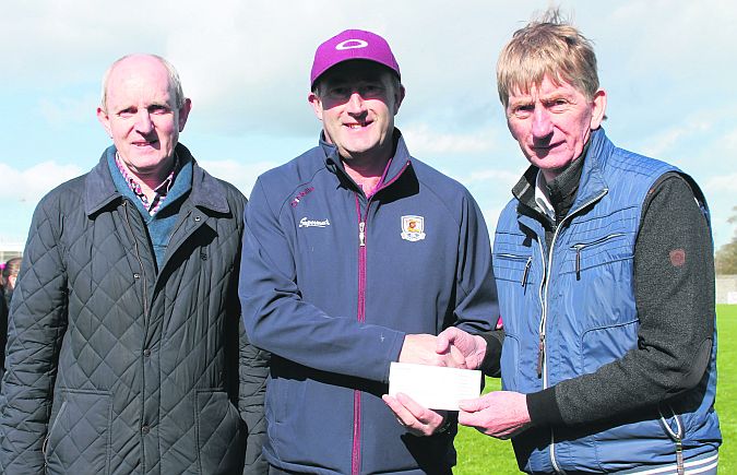 Liam Challoner of Challoner Trophies, Mountbellew, the new Galway Under 21 hurling championship sponsors, with Hurling Committee Chairman Michael Larkin and Secretary Pat Kearney.