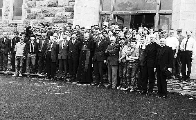 Bishop Browne pictured with the workers who built the new Galway Cathedral prior to its opening in August 1965.