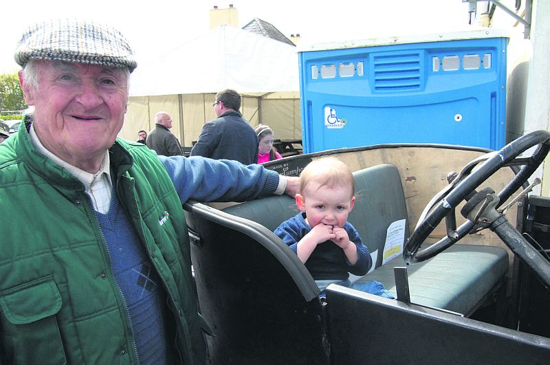 J.J. Carrick and his grandson Oisin Geraghty, Moylough, at last weekend's vintage day in Moylough. PHOTO: JOHNNY RYAN PHOTOGRAPHY.