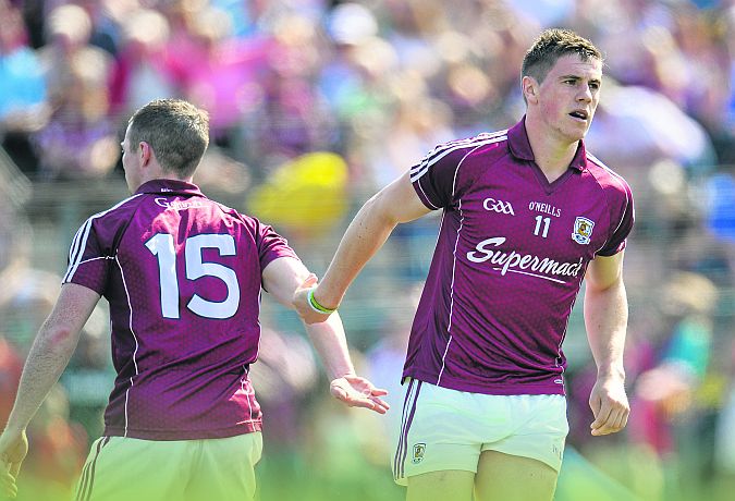 Galway's Shane Walsh celebrates with Danny Cummins after scoring a goal against New York in the preliminary round of the Connacht football championship at Gaelic Park on Sunday. Photo: Ray Ryan/Sportsfile.