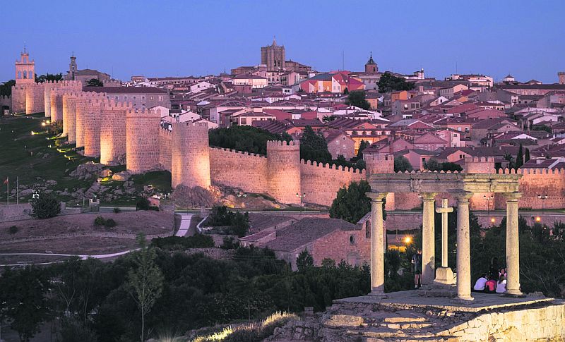 The walled old city of Avila by night - birthplace of St Teresa.